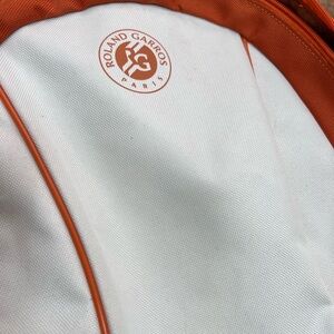 Used Wilson White and Orange Roland Garros Tennis Backpack.